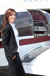 Female pilot and her light aircraft