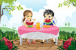 Kids eating watermelon in a park