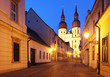 Historical street in Trnava with Saint Nicolas church Slovakia Historical street in Trnava with Saint Nicolas church Slovakia