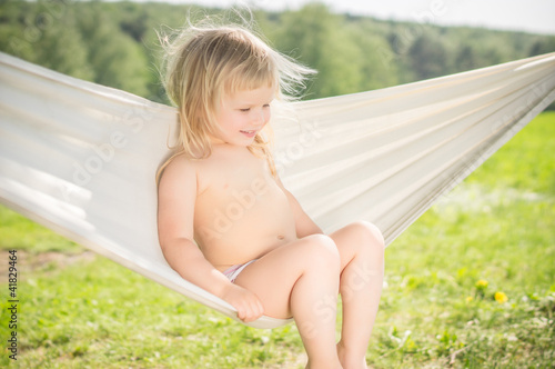 Photo: Adorable baby swing in hammock Adorable baby swing in hammock