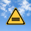 Traffic railway sign on beautiful sky background.