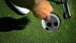 Ball rolling into the hole Ball rolling into the hole
