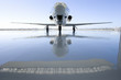 Photo : Aeroplane on runway, reflection on ground Aeroplane on runway, reflection on ground