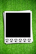 Photoframe with soccer  ball on artificial grass field texture