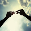 Photo: holding puzzle in sky holding puzzle in sky
