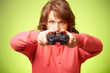 Beautiful womanl with gamepad playing vieogame