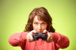 Beautiful womanl with gamepad playing vieogame