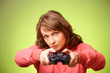 Beautiful womanl with gamepad playing vieogame