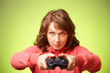 Beautiful womanl with gamepad playing vieogame