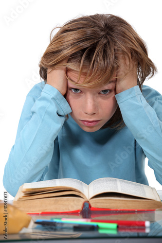 Photo: Stressed school kid Stressed school kid