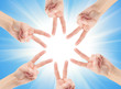 Photo: Hands of teamwork , forming the star shape Hands of teamwork , forming the star shape