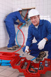 Plumbers at work