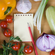 Fresh vegetables and a notebook