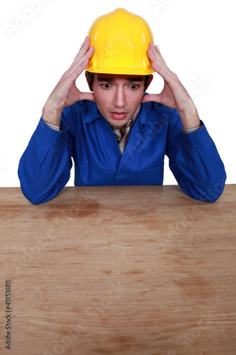 Photo: Stressed construction worker Stressed construction worker