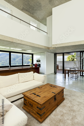 Photo: beautiful modern house in cement, interior, living room beautiful modern house in cement, interior, living room