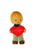 Resin boy doll hold heart present love concept Resin boy doll hold heart present love concept