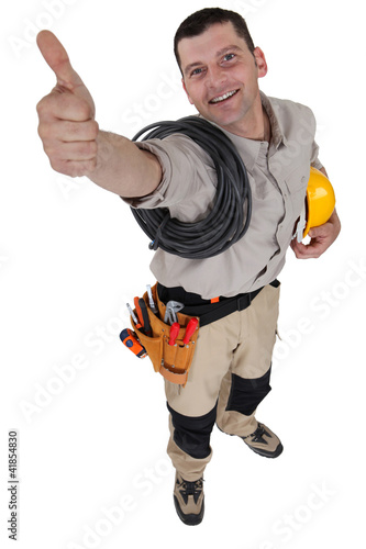 Photo: Electrician giving the all-clear Electrician giving the all-clear