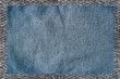 cloth attached by threads to jeans