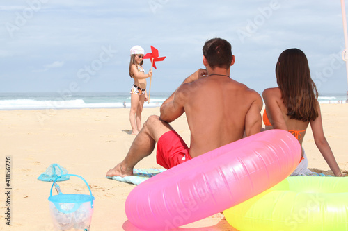 Foto: Family at the beach together Family at the beach together