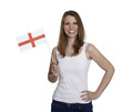Attractive woman shows flag of England and smiles