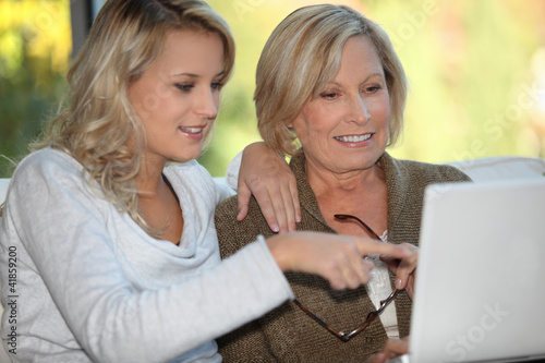Photo: Mother and daughter on the computer Mother and daughter on the computer