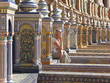 Tourist viewing ornate building in Plaza de Espana, Seville, Spain