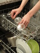 Discharging dishwasher Discharging dishwasher