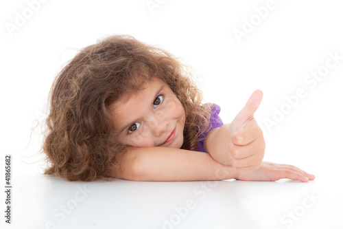 Photo: child thumb up child thumb up