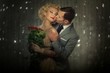 Happy couple with red roses