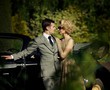 Couple near a retro car outdoors