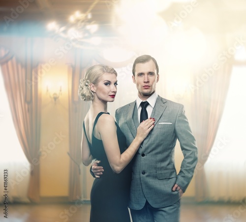 Photo: Retro couple in luxury interior Retro couple in luxury interior