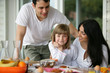 Family having breakfast together