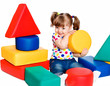 Photo: little girl playing in the constructor little girl playing in the constructor