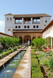 The Court of la Acequia inside Alhambra, Granada The Court of la Acequia inside Alhambra, Granada