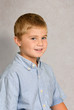 Photo: Young Boy Posing for Portrait Young Boy Posing for Portrait