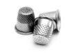 Thimbles on a white background.