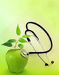 natural medicine stethoscope and apple concept