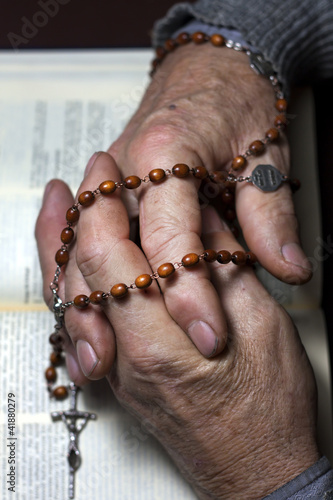 Photo: prayer old hands praying in church prayer old hands praying in church