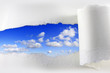 Torn paper on blue sky abstract background