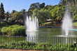 Picturesque lake with islands and fountains