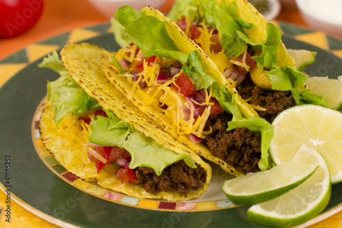 Photo: Beef Tacos - Mexican minced beef tacos with salsa, cheese & lime Beef Tacos - Mexican minced beef tacos with salsa, cheese & lime