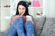 Attractive girl writing notes at home smiling Attractive girl writing notes at home smiling
