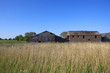 old barns and reed beds