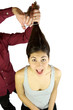 Girl screaming getting long hair cutted by hairdresser