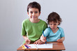 Little boys drawing together