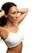 Tan woman grasping sides of head
