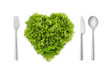 heart-shaped salad, lettuce with fork, spoon, knife