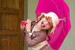 Joyful girl with umbrella