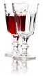 Glass of red wine and empty glass with reflection. Glass of red wine and empty glass with reflection.