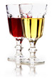 Glasses of white and red wine with reflection. Glasses of white and red wine with reflection.